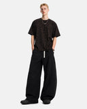 Model walking in Cordura wide leg pants showing movement and drape