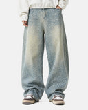 model wearing light blue polka dot baggy jeans front view