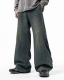 deconstructed straight-leg jeans front view