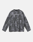 detail view of distressed washed stripe pattern on tee