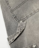 deconstructed seam and pocket detail on barrel jeans