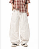 Back view of Cordura nylon wide leg pants with utility pocket design