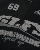 close-up of distressed front graphic on black suede hoodie