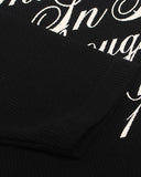 black waffle fabric and sleeve construction detail