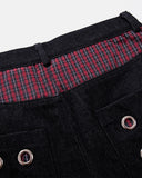 plaid waistband detail on black baggy jeans