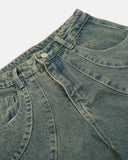 curved pocket detail on dirty blue washed jeans