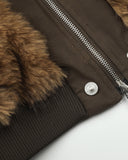 ribbed hem and front zipper detail on brown bomber jacket