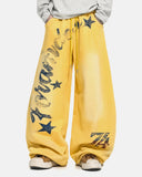 yellow oversized sweatpants with script print