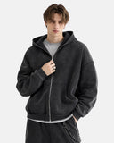 upper body model wearing black washed zip up hoodie