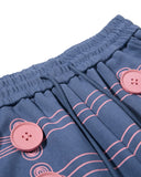 button loop line graphic detail on blue sweatpants