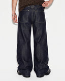 model wearing Paris buckle baggy jeans back view