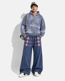 full body model wearing blue button detail wide leg sweatpants