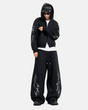 model wearing cropped zip up hoodie with hood