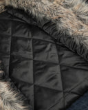 quilted padded lining and faux fur trim detail close-up