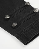 black denim jacket cuff button strap detail close-up
