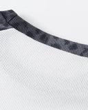 raglan neckline construction detail on leopard long sleeve tee