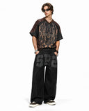 studded artwork baggy denim pants