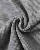 gray waffle fabric texture close up