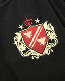 crest graphic detail on black barrel sweatpants