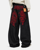 model wearing wide leg washed denim jeans detail view