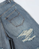 distressed denim jorts with oversized fit