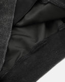 close-up of ribbed cuff and washed black hoodie fabric