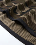 close-up of elastic hem binding on camo hoodie