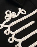 white braided cord embroidery close up