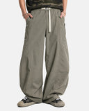 Full outfit styling with Cordura wide leg pants and casual plaid shirt