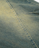 curved seam detail on washed barrel jeans