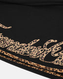 script graphic and leopard stripe detail