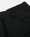detail view of fabric texture on black cargo pants