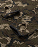 close-up of thumbhole cuff detail on camo hoodie