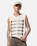 model wearing embroidered knit tank top for streetwear outfit