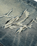 ripped wide-leg denim jeans detail