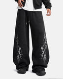 Front shot black thorn graphic wide leg sweatpants