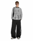 Full body shot men striped raglan tee outfit