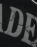 close-up of cracked letter graphic on zip hoodie