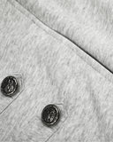 grey fabric with silver button detail close-up