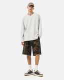 front view of camo knee-length shorts with raw hem finish