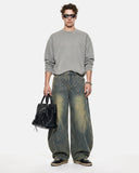 full-body styling with washed curved seam barrel jeans