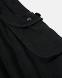 detail view of pocket flap on black cargo pants