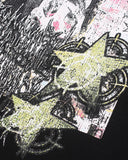 yellow star accent detail on distressed graphic print