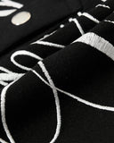 white script embroidery detail on black air layer fabric