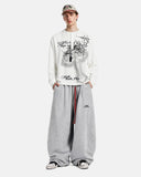 model styling white cross graphic henley t shirt with Barrel sweatpant