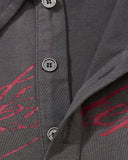 three button placket detail on washed graphic polo shirt