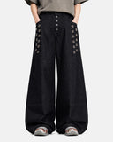 model wearing button fly baggy jeans front view