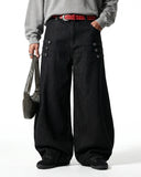 model wearing side button barrel jeans front view