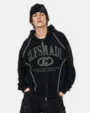 model front view wearing puff print graphic boxy zip hoodie