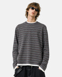 model upper body wearing striped boxy long sleeve tee